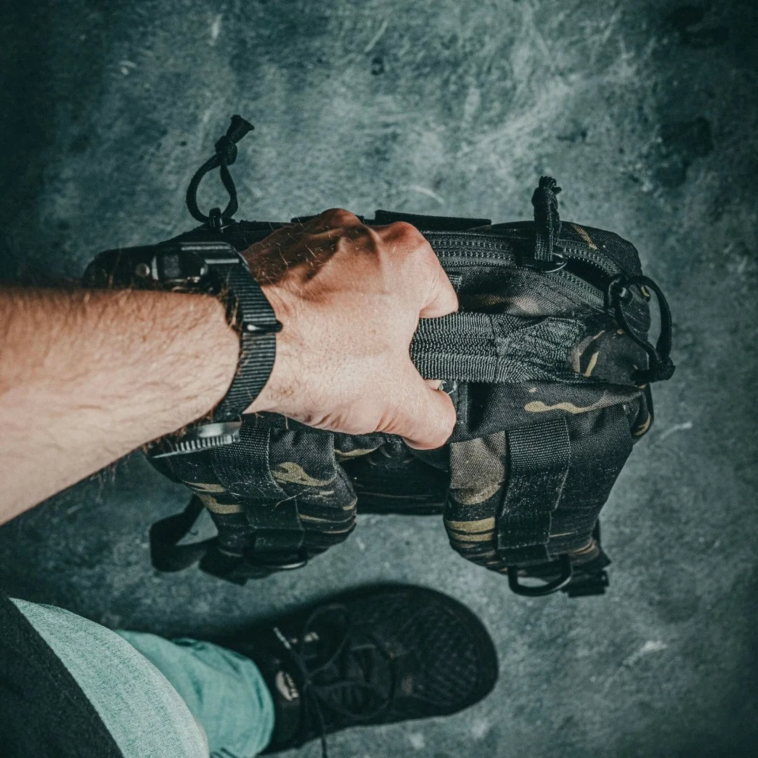 Recycled Firefighter 12 Hour pack in 12 hr mcamblk. Streamlined design handles half-day missions without bulk.