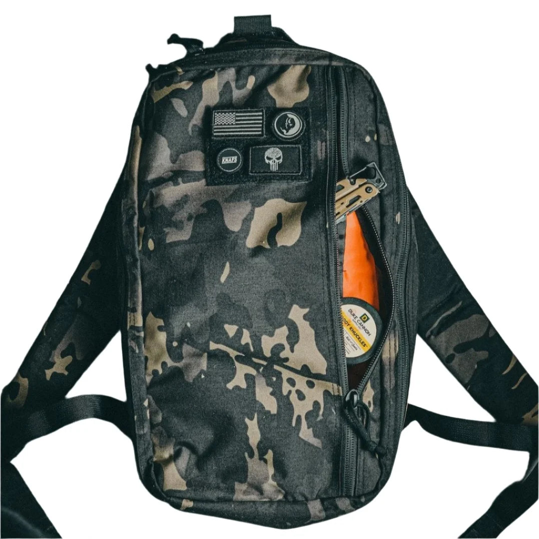 Recycled Firefighter 12 Hour pack in 12 hr mcamblk. Streamlined design handles half-day missions without bulk.