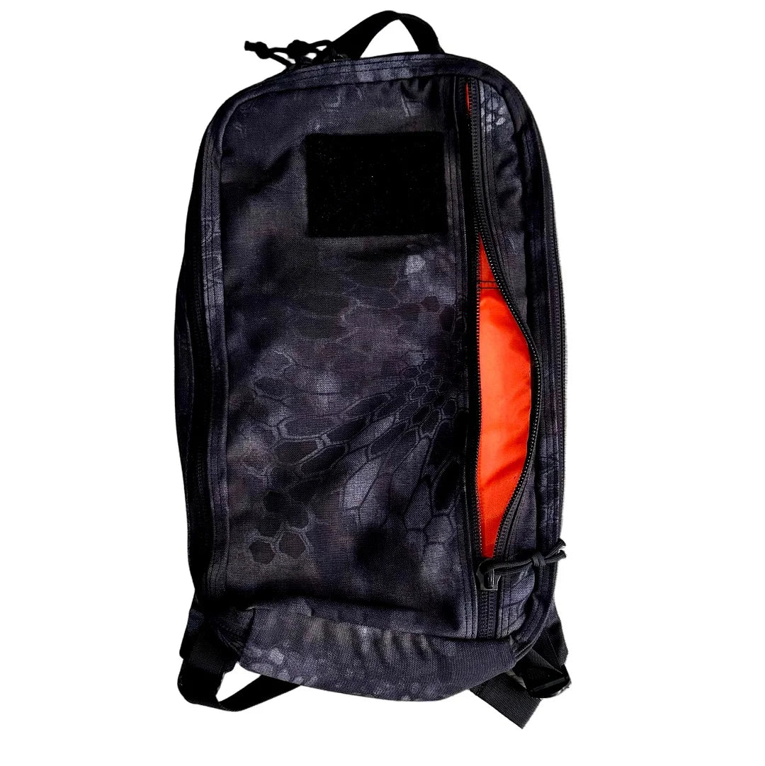 Tactical 12 Hour Backpack in 12 hr typhon by Recycled Firefighter. Quick-access pockets organize essentials efficiently.