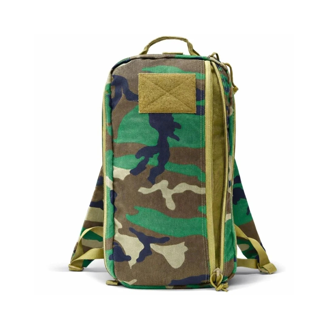 Tactical 12 Hour Backpack in 12 hr woodland coyote by Recycled Firefighter. Quick-access pockets organize essentials efficiently.