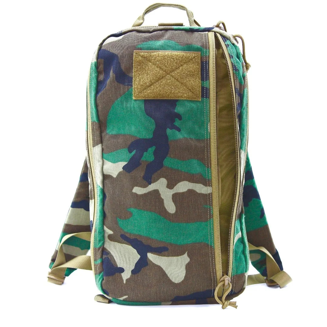 Tactical 12 Hour Backpack in 12 hr woodland coyote by Recycled Firefighter. Quick-access pockets organize essentials efficiently.