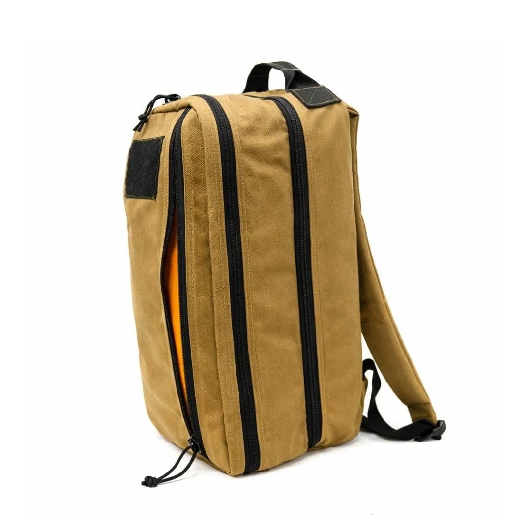 The Recycled Firefighter 12 Hour Plus Backpack in Coyote Brown is a rugged, 24-liter tactical EDC pack featuring dual clamshell compartments and durable 1000D Cordura construction.