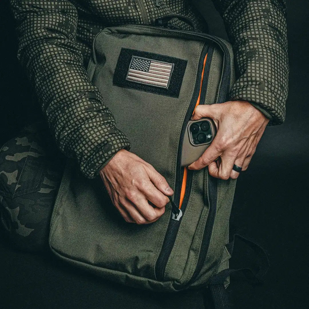 Professional 24 Hour pack in ranger green by Recycled Firefighter. MOLLE-compatible design adapts to changing mission needs.