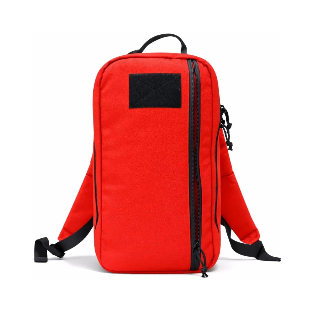 24 Hour tactical backpack in red by Recycled Firefighter. Spacious main compartment handles full-day mission requirements.