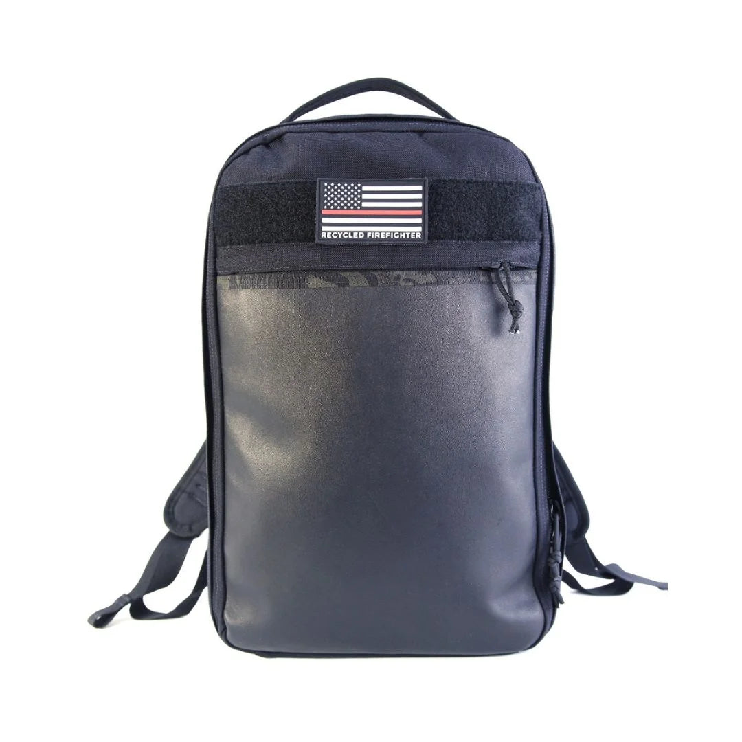 The Chief tactical backpack from Recycled Firefighter featuring durable black combat leather and MultiCam Black webbing.