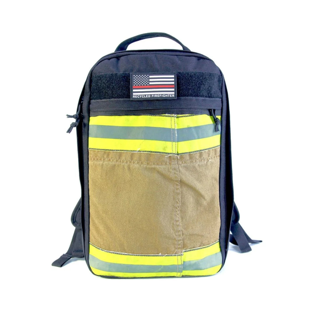 The Chief USA-made tactical backpack by Recycled Firefighter featuring a high-visibility yellow repurposed firefighter bunker gear front panel.