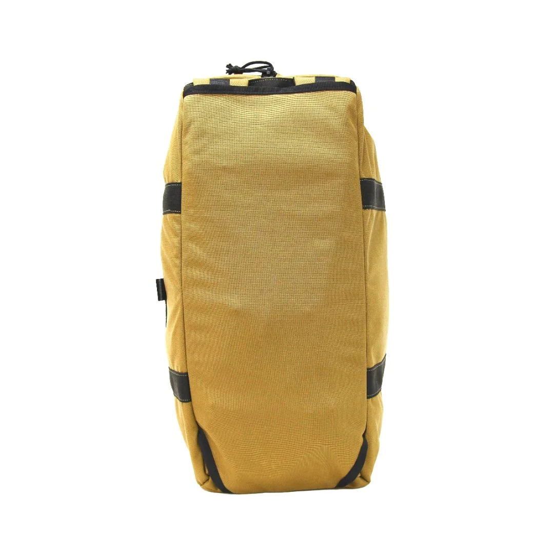 The Recycled Firefighter 72 Hour Duffle Backpack in coyote tan with black accents provides a rugged, desert-style look.