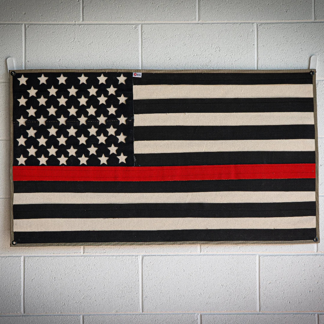 Professional-grade American Flag Fire Hose Thin Red Line in American Flag - Fire Hose - Thin Red Line from Recycled Firefighter. Quality tactical design for first responders.