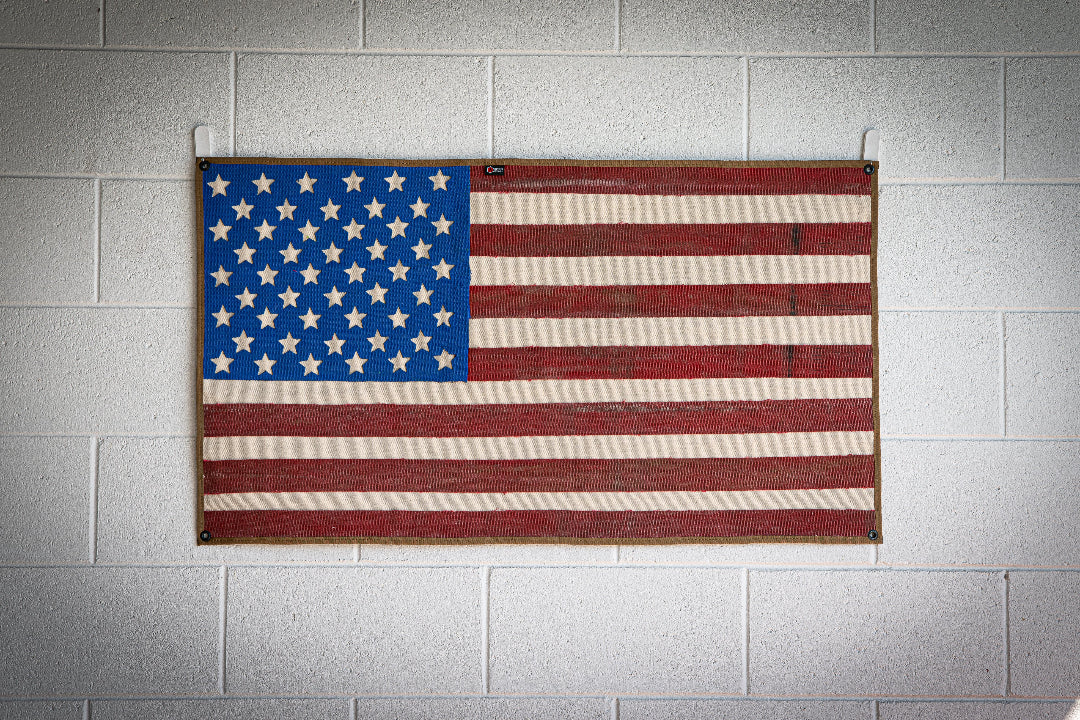 American Flag Fire Hose Vintage hanging on the bricks wall RecycledFirefighter