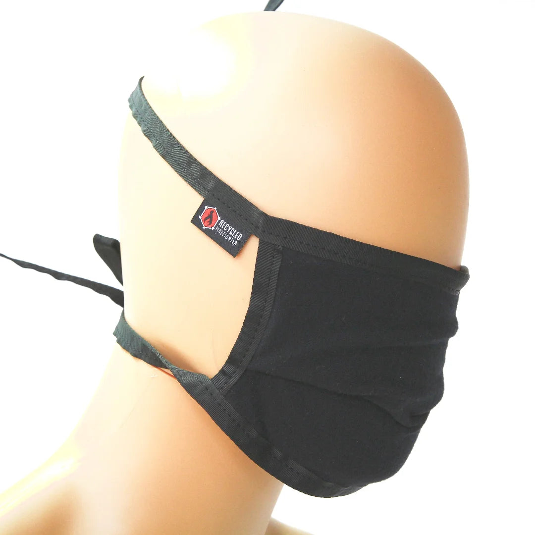 The black multicamblack Cotton Mask from Recycled Firefighter. Tactical quality meets professional design standards.