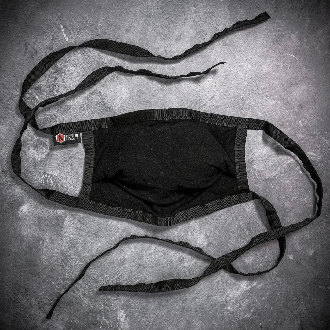 Cotton Mask in black black by Recycled Firefighter. Durable professional gear for tactical applications.