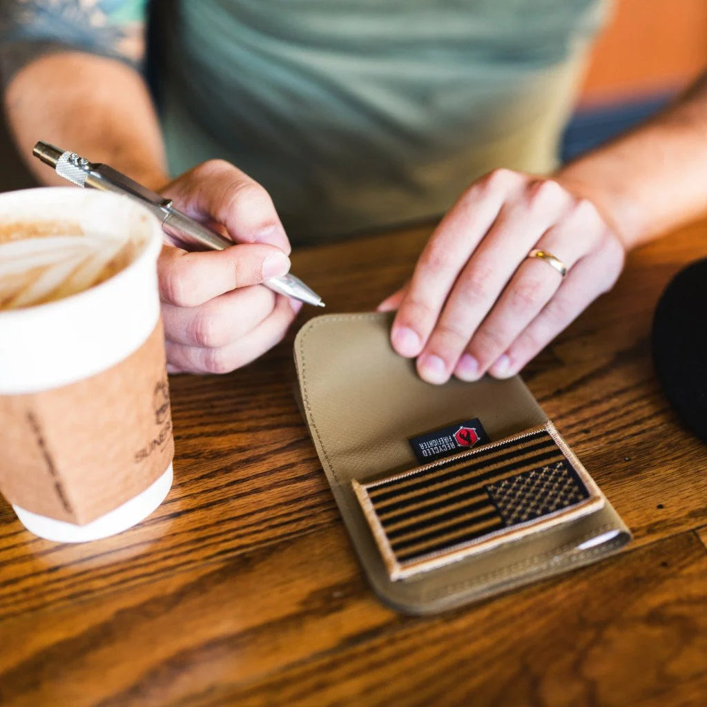 The Field Notes Wallet from Recycled Firefighter. Professional-grade quality for everyday tactical use and operations.