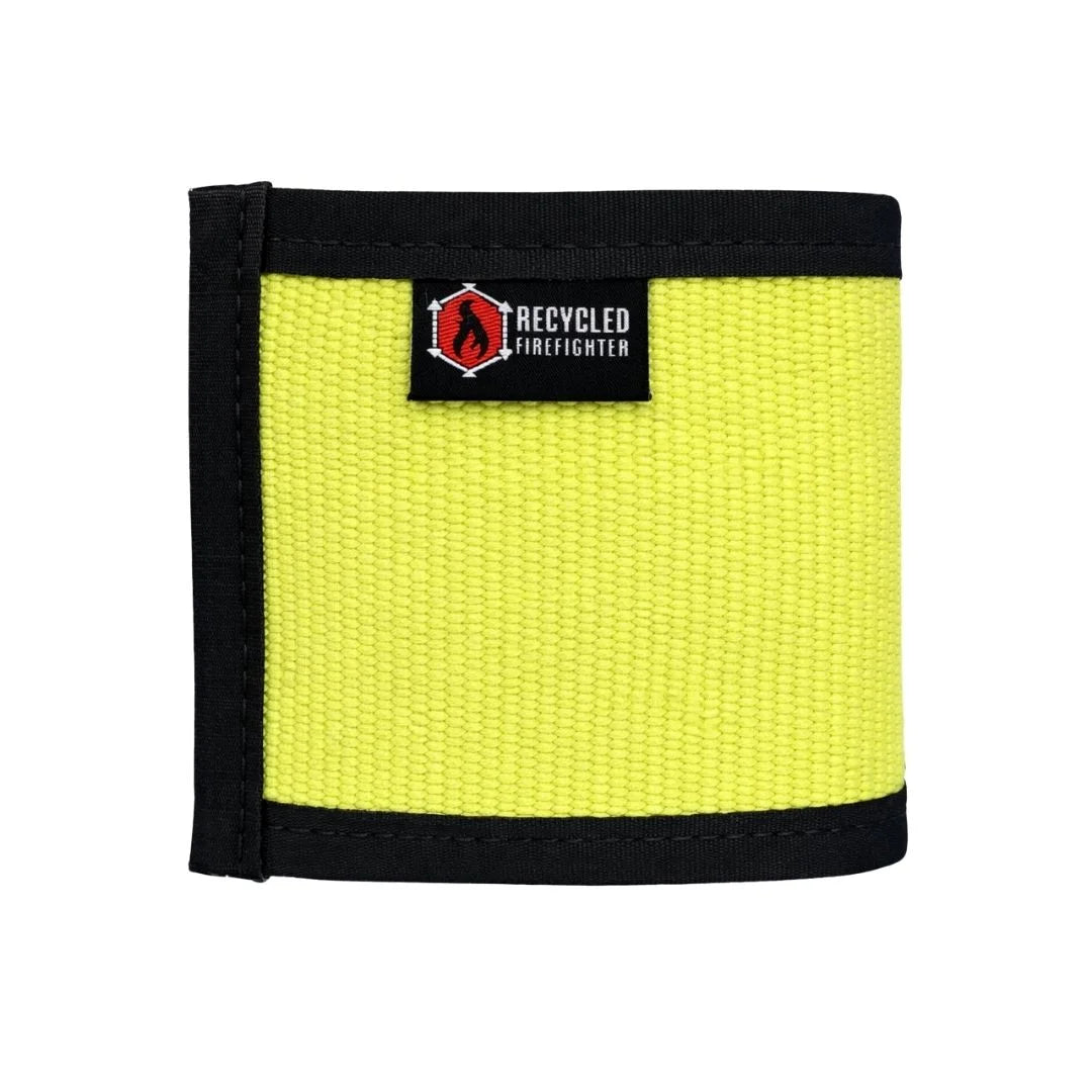 Bright yellow Fire Hose Drink Sleeve by Recycled Firefighter. High-visibility insulation honors firefighter heritage.