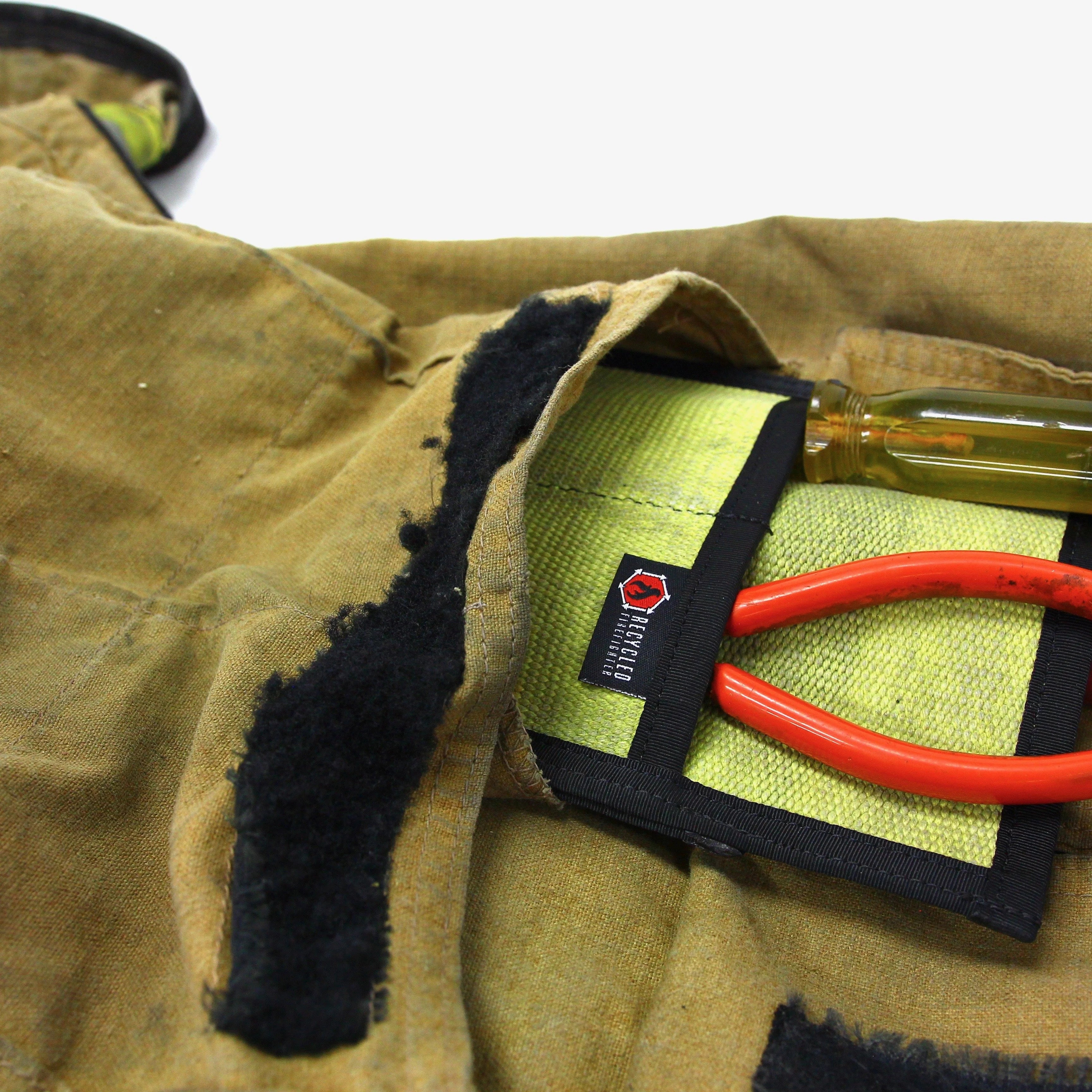 Recycled Firefighter yellow & black Fire Hose Tool Pouch. Professional-grade tactical construction for daily operations.