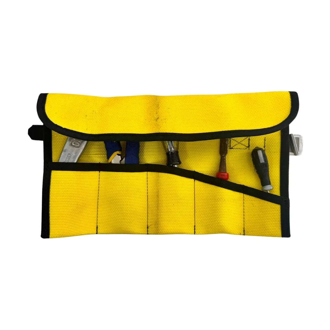 Yellow Fire Hose Tool Roll by Recycled Firefighter featuring durable repurposed fire hose material. This rugged tool organizer is handcrafted in the USA for secure everyday carry and vehicle gear storage.