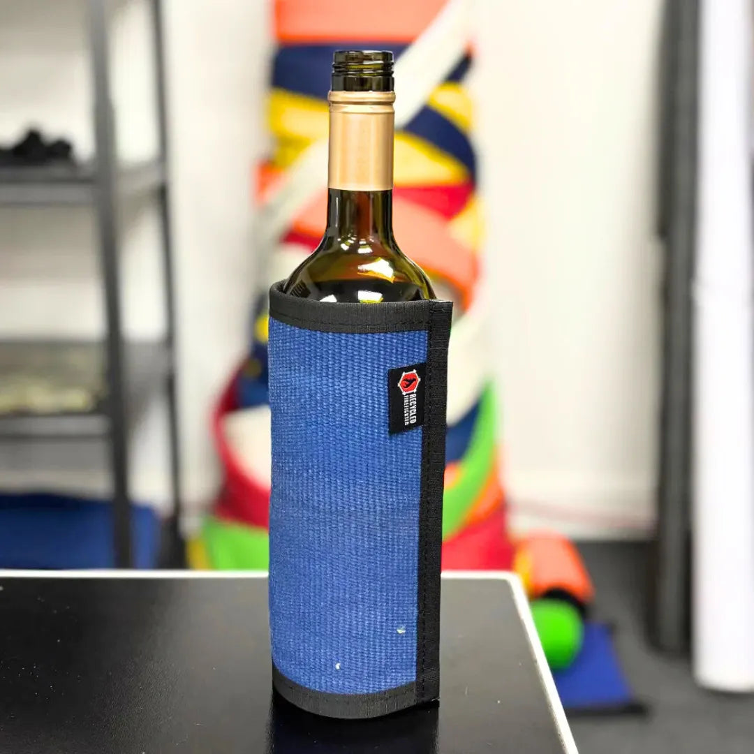 The Blue Firehose Wine Bottle Cover from Recycled Firefighter. Tactical quality meets professional design standards.