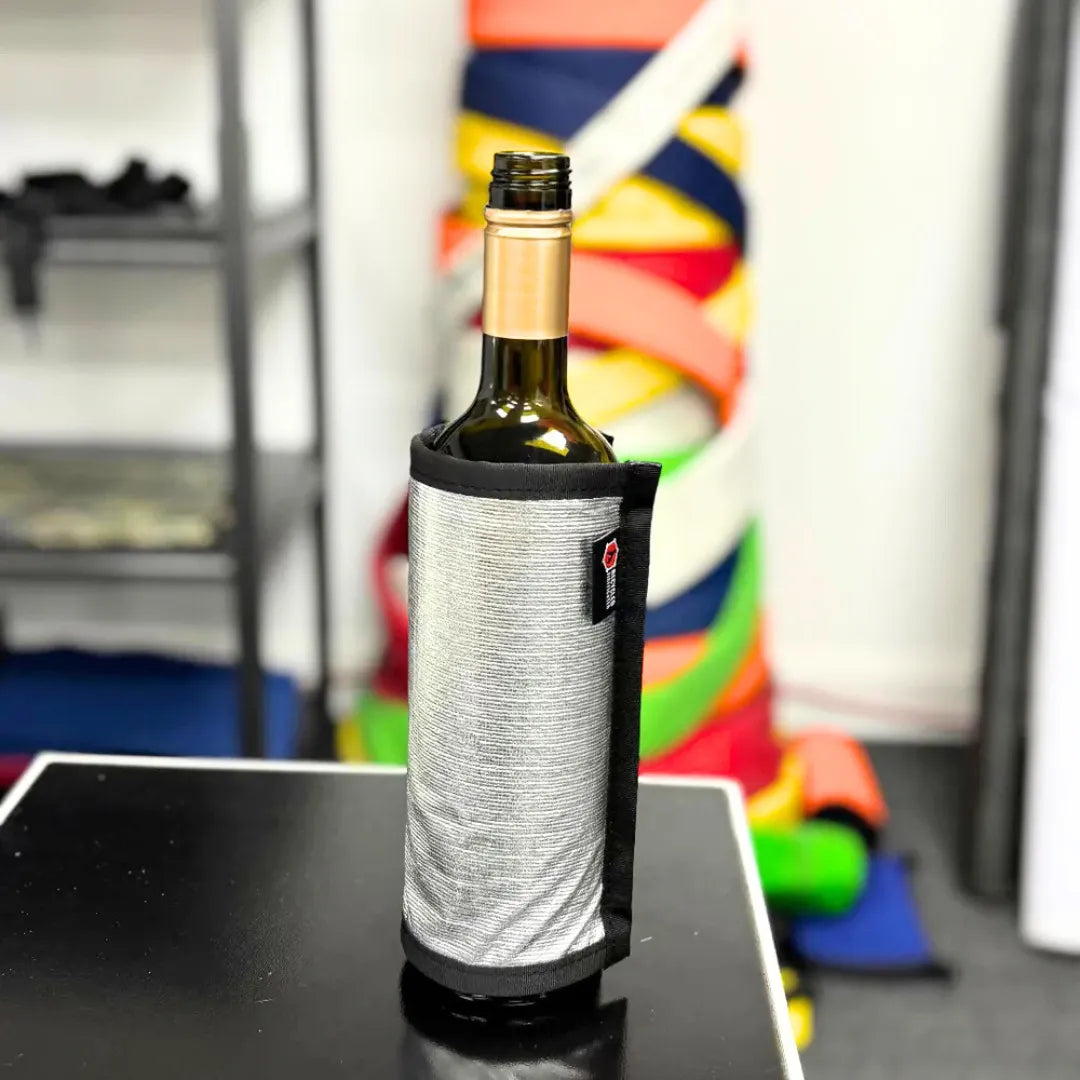 Professional Firehose Wine Bottle Cover featuring Silver by Recycled Firefighter. Honors first responder service with durability.
