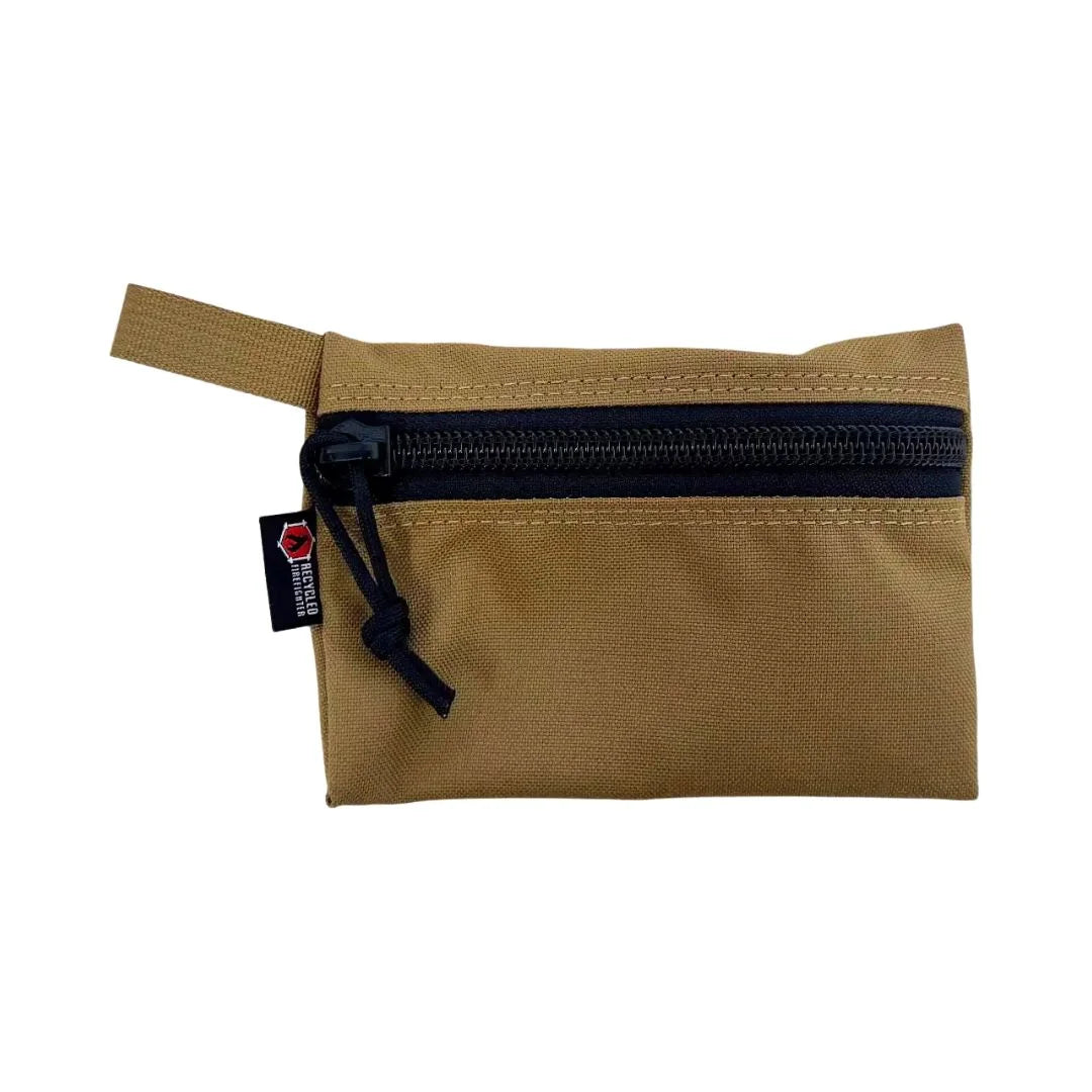 The Flat Zippered Gear Pouch Small in Coyote by Recycled Firefighter. Tactical design meets professional durability standards.