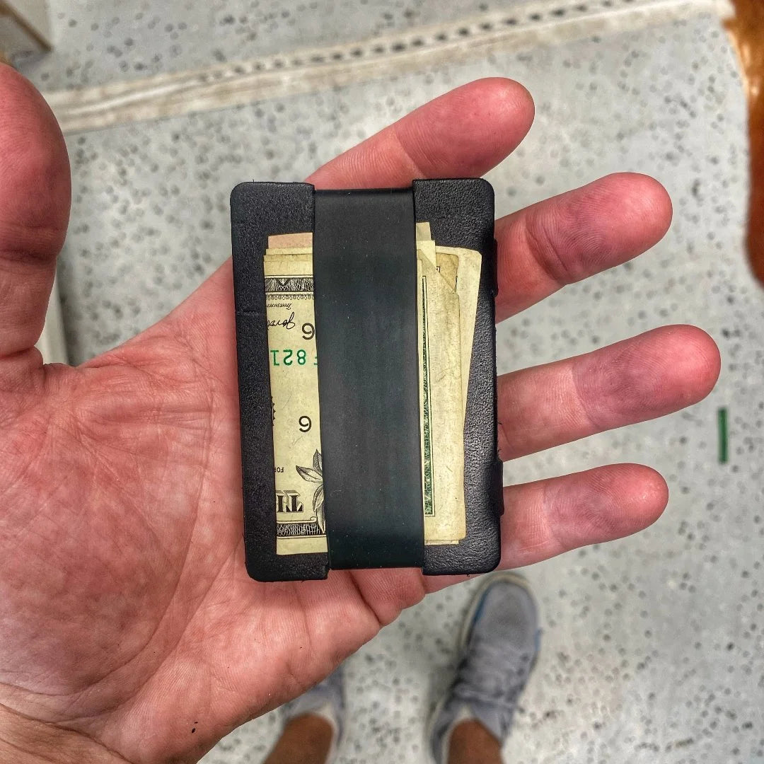 The Full Grain Leather Card Wallet in black from Recycled Firefighter. Professional-grade quality for everyday tactical use and operations.