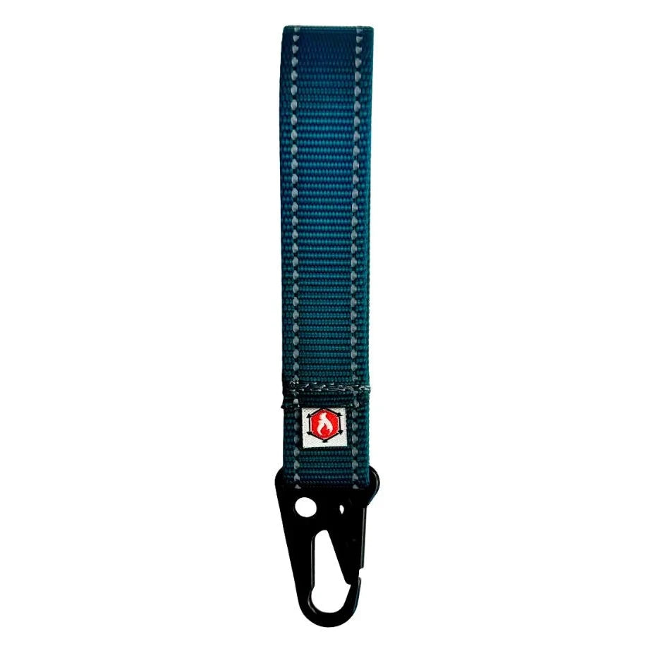 The Recycled Firefighter Grab & Go Loop in Teal combines a unique aesthetic with Mil-Spec webbing for reliable gear management.