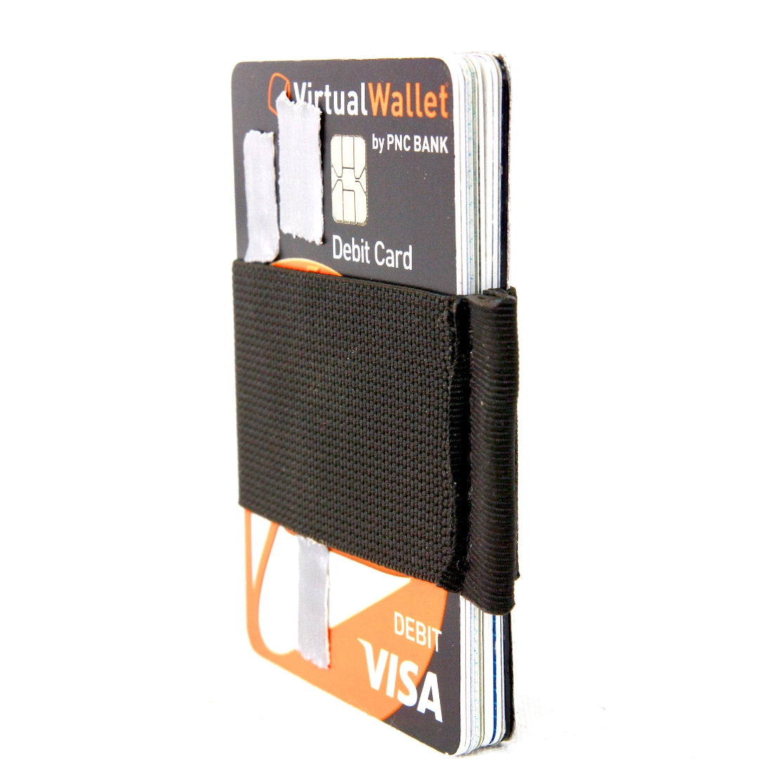 The black edition Minimalist Elastic Card Band Wallet from Recycled Firefighter. Tactical quality designed for demanding professionals.