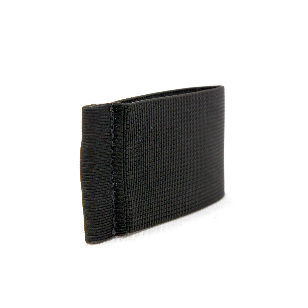 The black edition Minimalist Elastic Card Band Wallet from Recycled Firefighter. Tactical quality designed for demanding professionals.