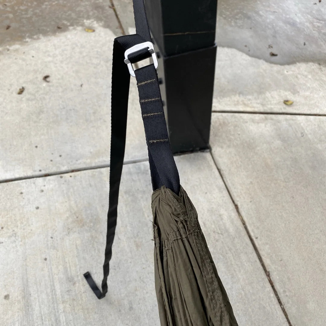 Recycled Firefighter Parachute Hammock featuring olive drab. Durable construction honors service with professional quality.