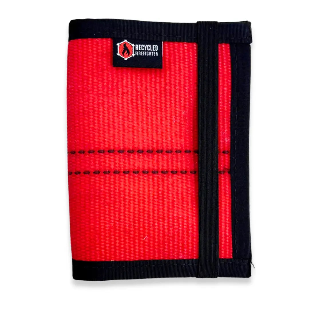 The Red and Black edition Passport Notebook Wallet Firehose from Recycled Firefighter. Tactical quality designed for demanding professionals.