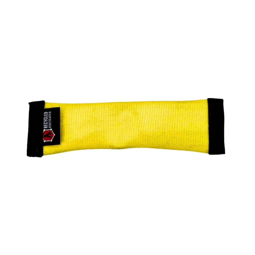 A high-visibility yellow and black JR dog fetch toy from Recycled Firefighter, handcrafted from recycled fire hose with reinforced black mil-spec binding.