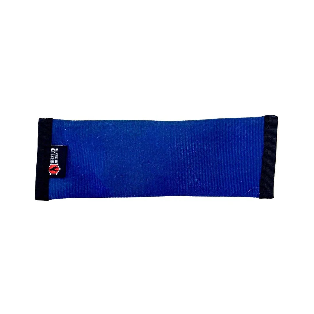 A Recycled Firefighter small dog fetch toy featuring blue recycled fire hose material and rugged black edge binding, built for tough chewers and active dogs.
