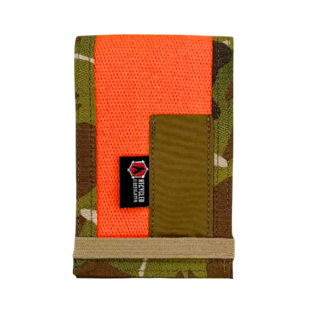 Rite In The Rain Notebook Cover in Orange and Multicam by Recycled Firefighter. Durable professional gear for tactical applications.