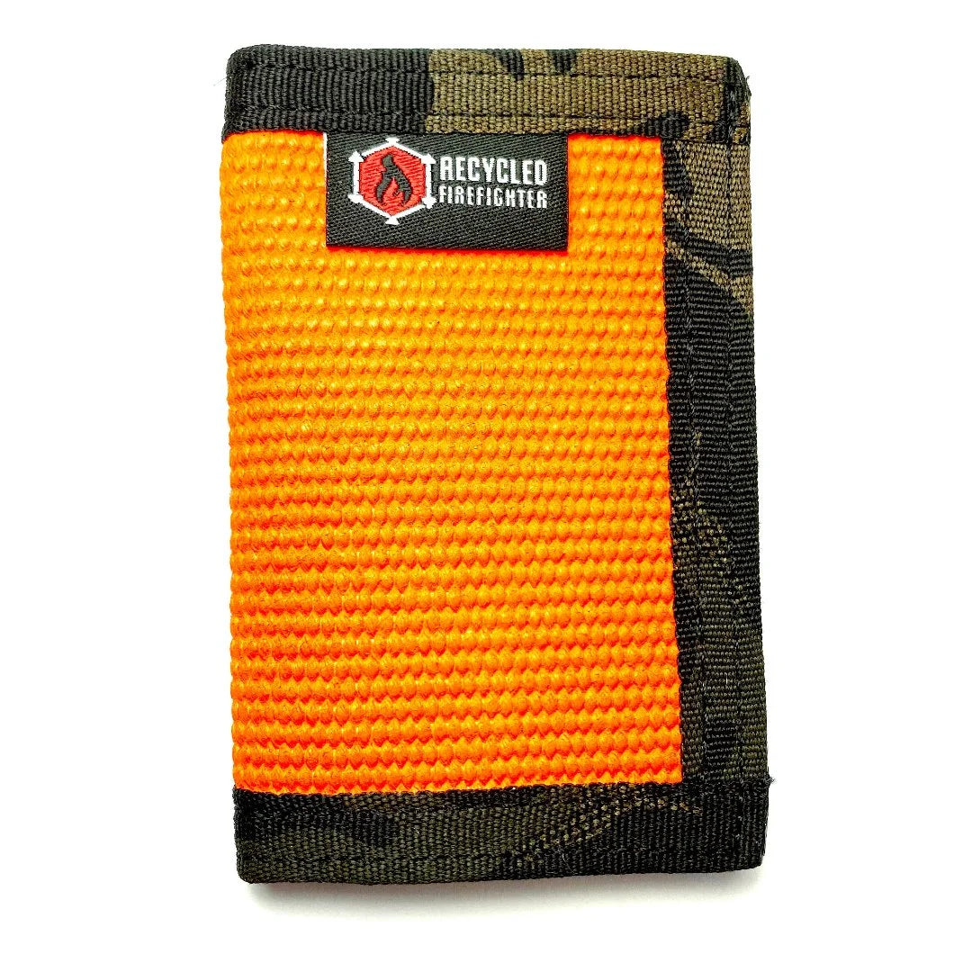Orange fire hose with multicam black Rookie Wallet by Recycled Firefighter. Blends visibility with tactical styling.