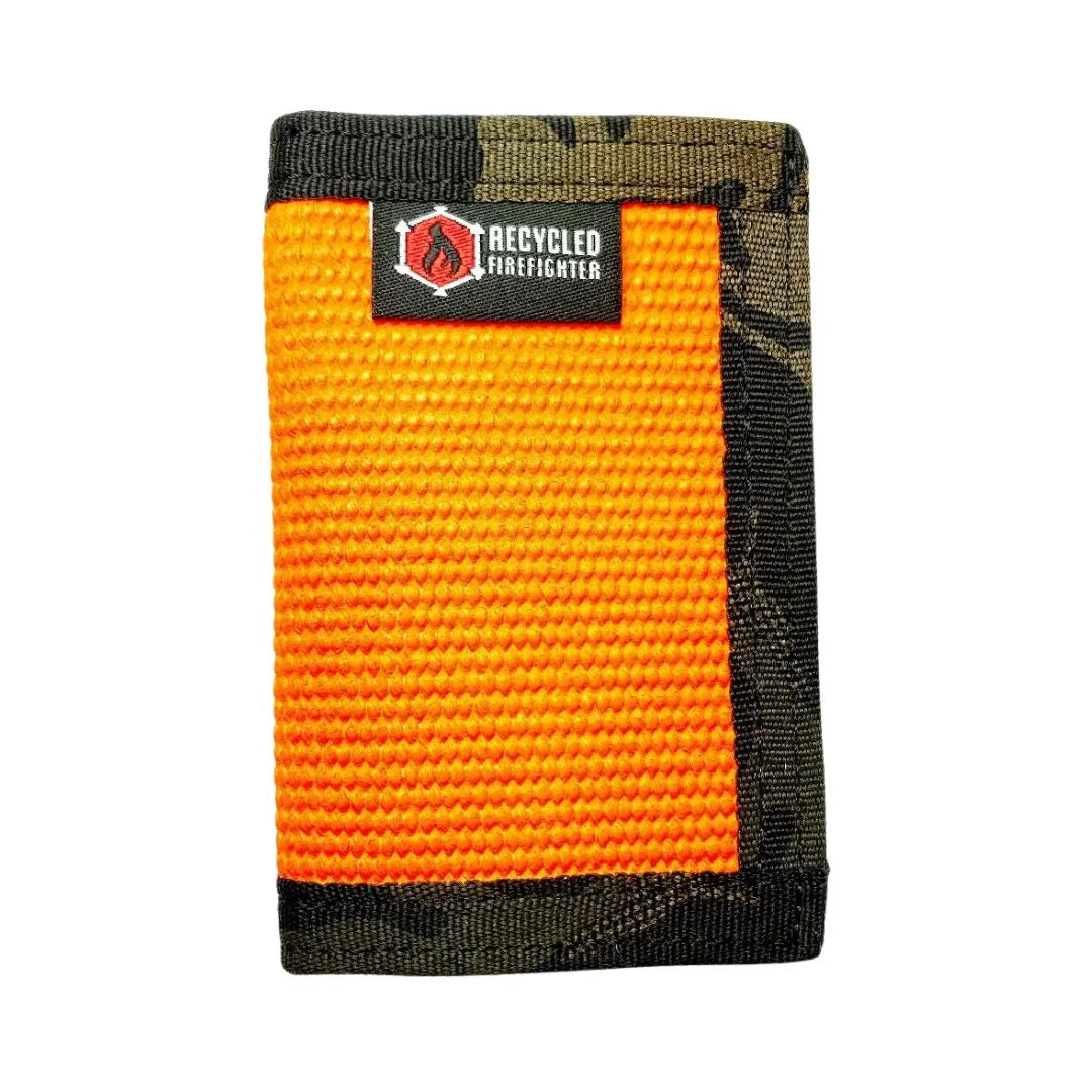 Orange fire hose with multicam black Rookie Wallet by Recycled Firefighter. Blends visibility with tactical styling.