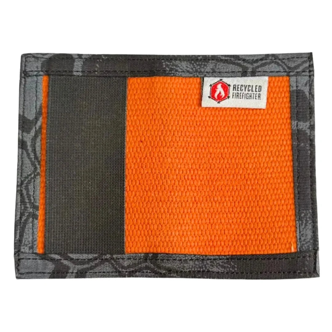Bright orange meets typhon camo in this Rookie Wallet. Recycled Firefighter combines visibility with concealment.