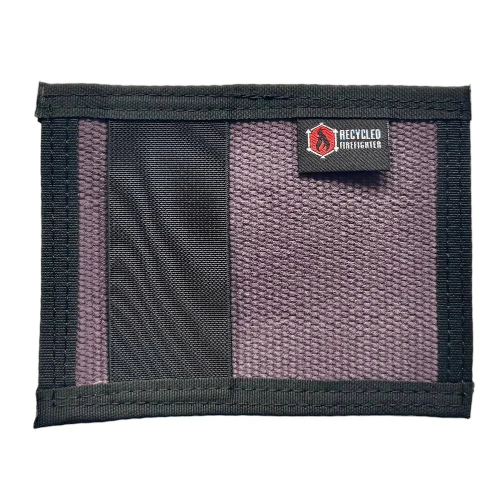 Unique purple and black Rookie Wallet by Recycled Firefighter. Distinctive fire hose design stands out.