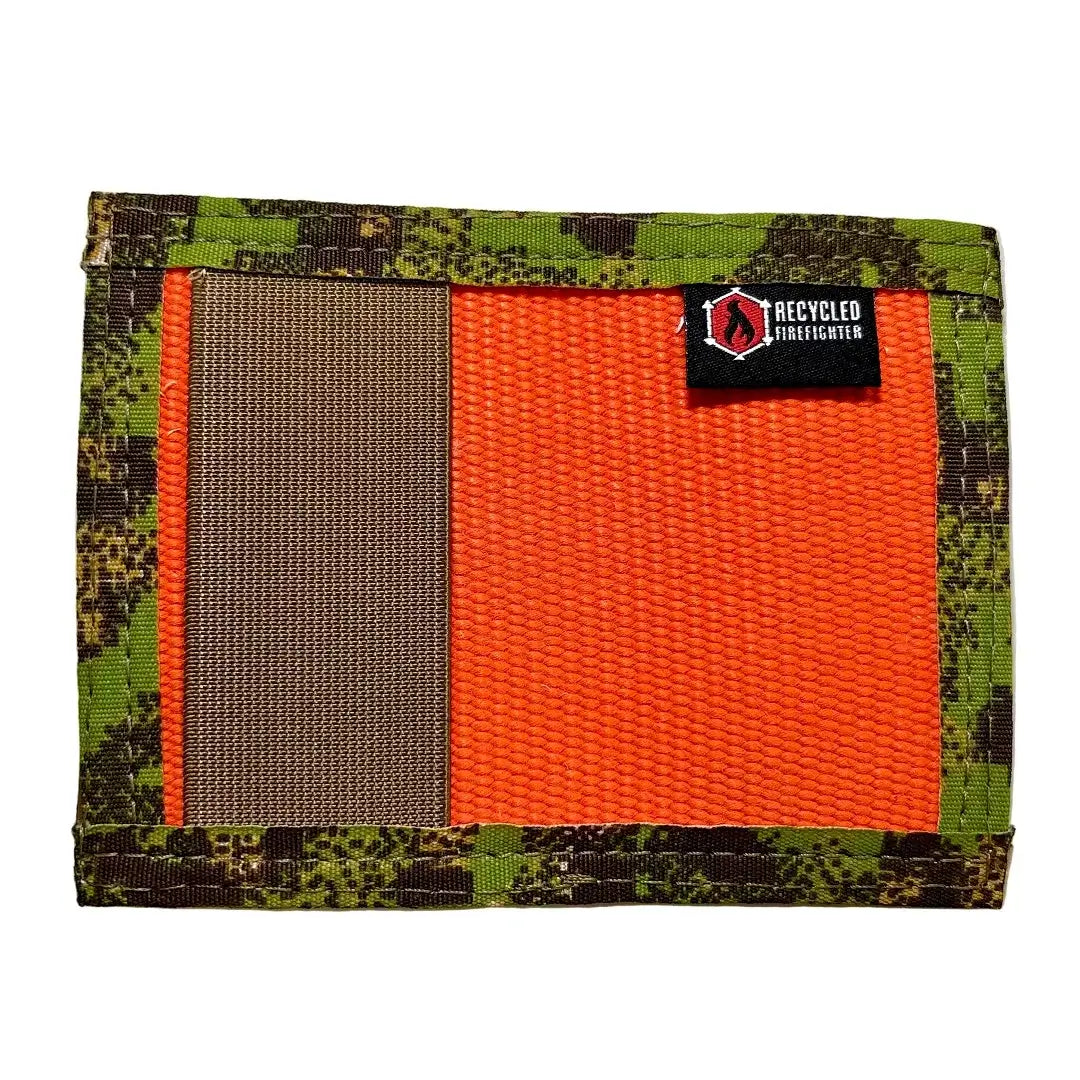 Recycled Firefighter 'The Rookie' wallet in Orange and Green Digital Camo. This durable bifold is made from repurposed fire hose and features a military-style camouflage trim and exterior cash strap.