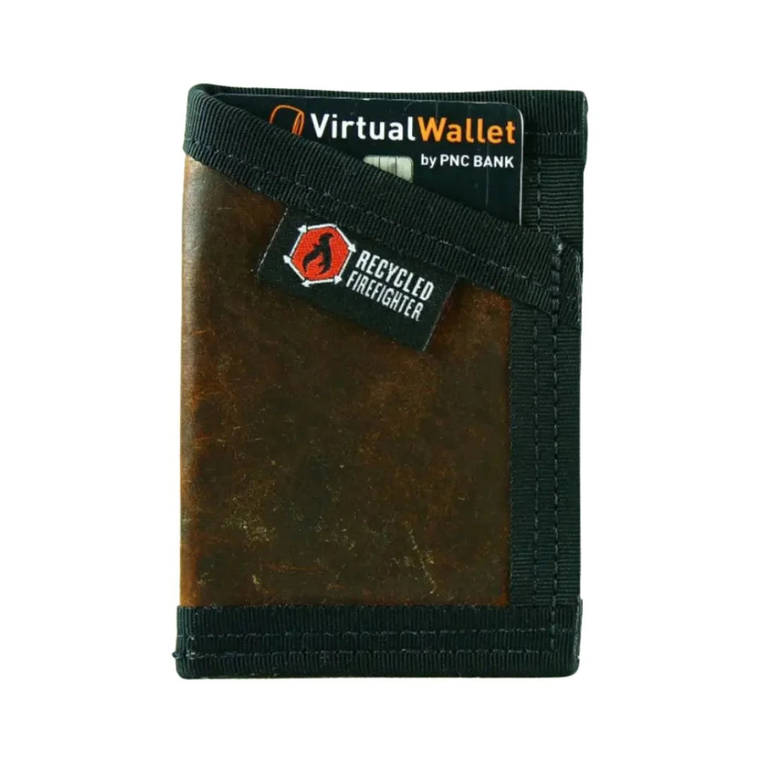 Dark brown and black combat leather Sergeant Wallet from Recycled Firefighter. Rich leather tones mature beautifully over time.