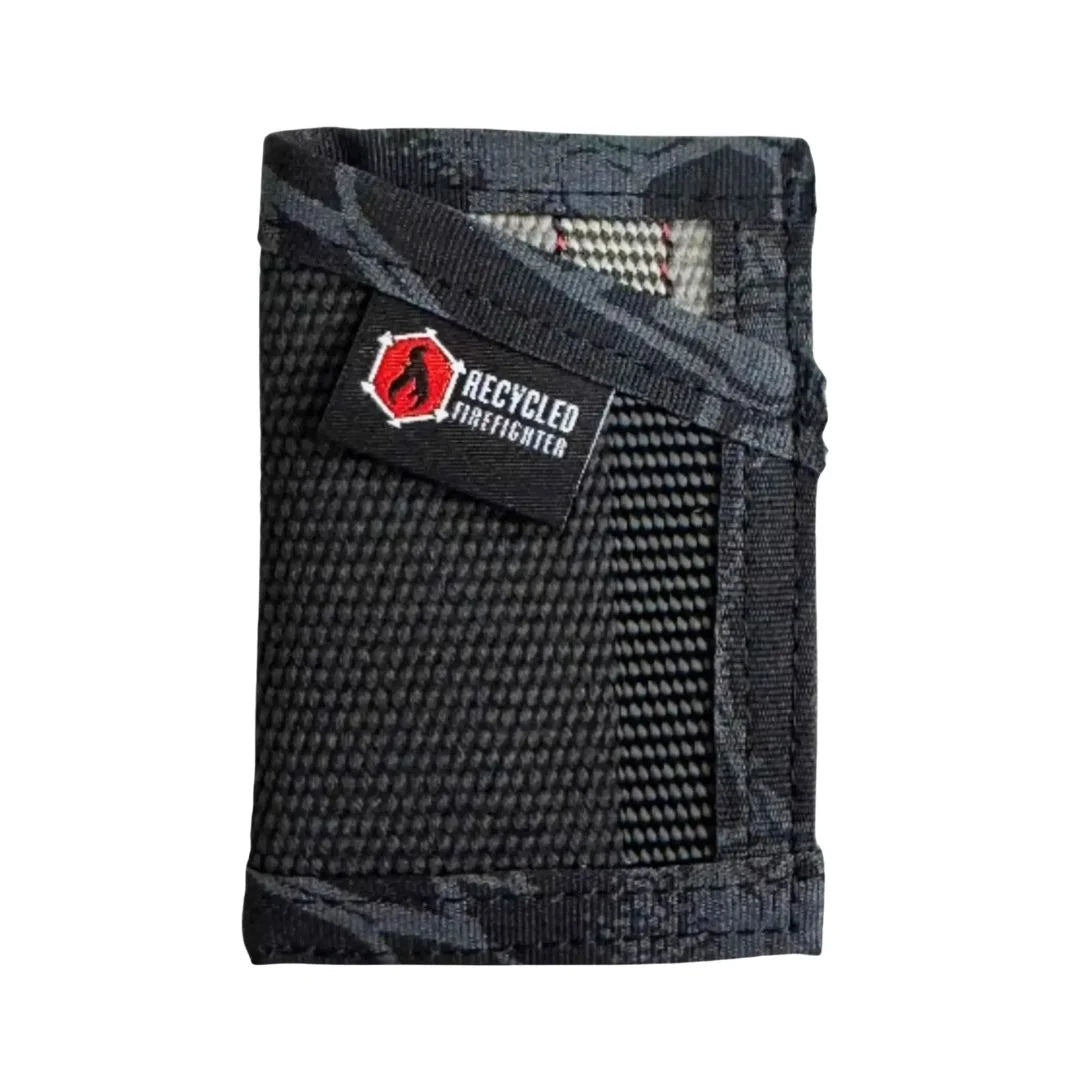 Black exterior with typhon interior Sergeant Wallet. Recycled Firefighter combines understated appearance with advanced camouflage lining.