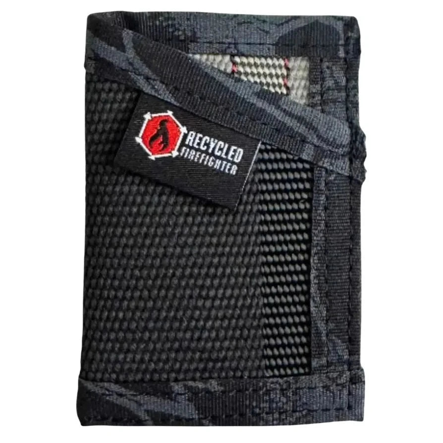 Black exterior with typhon interior Sergeant Wallet. Recycled Firefighter combines understated appearance with advanced camouflage lining.