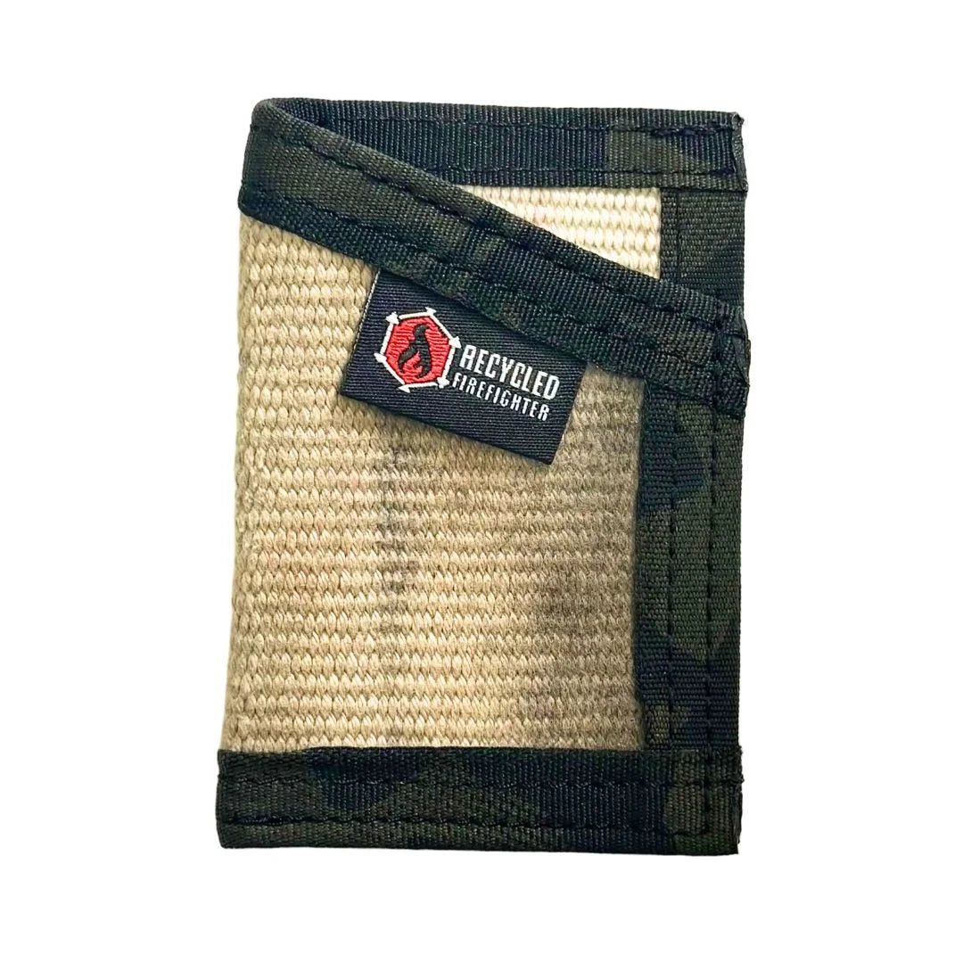 Olive drab meets multicam black in this Sergeant Wallet. Recycled Firefighter blends military heritage with modern tactical design.