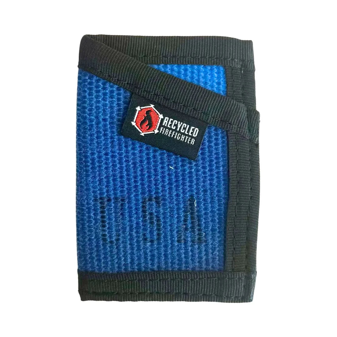 The Blue Sergeant Wallet Firehose Edition from Recycled Firefighter includes a heavy-duty black elastic band for cards and cash.