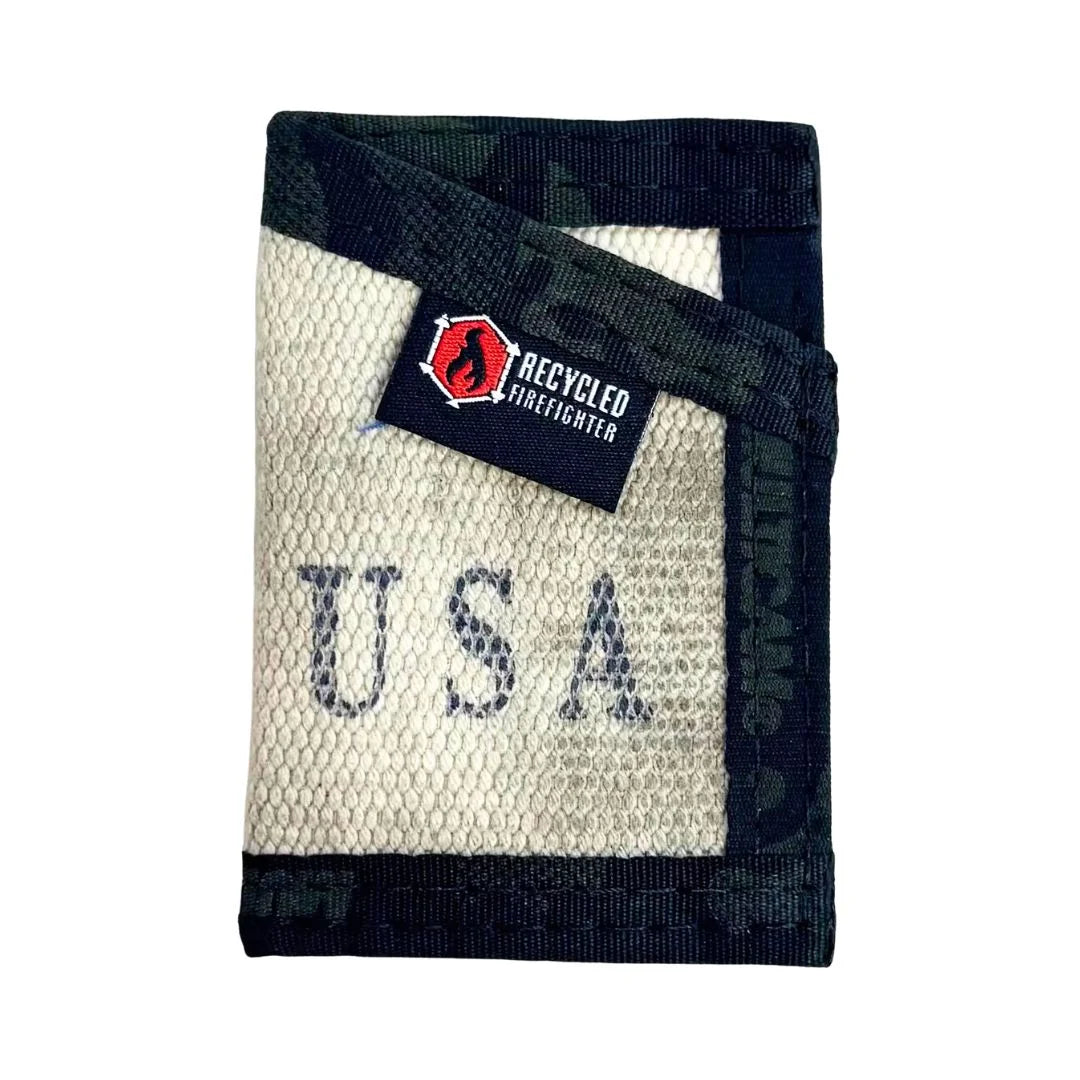 This Olive Drab Sergeant Wallet Firehose Edition from Recycled Firefighter highlights a dark Multicam Black elastic strap.