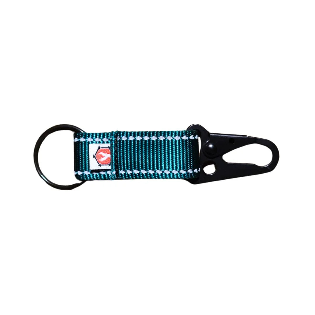 Professional The Chauffeur Durable keychain clip featuring Teal by Recycled Firefighter. Honors first responder service with durability.