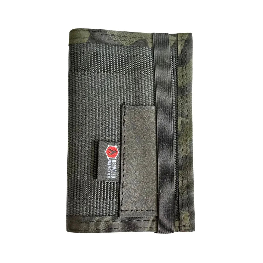 The Inspector Notebook in Black and Multicamblack by Recycled Firefighter. Durable professional gear for tactical applications.