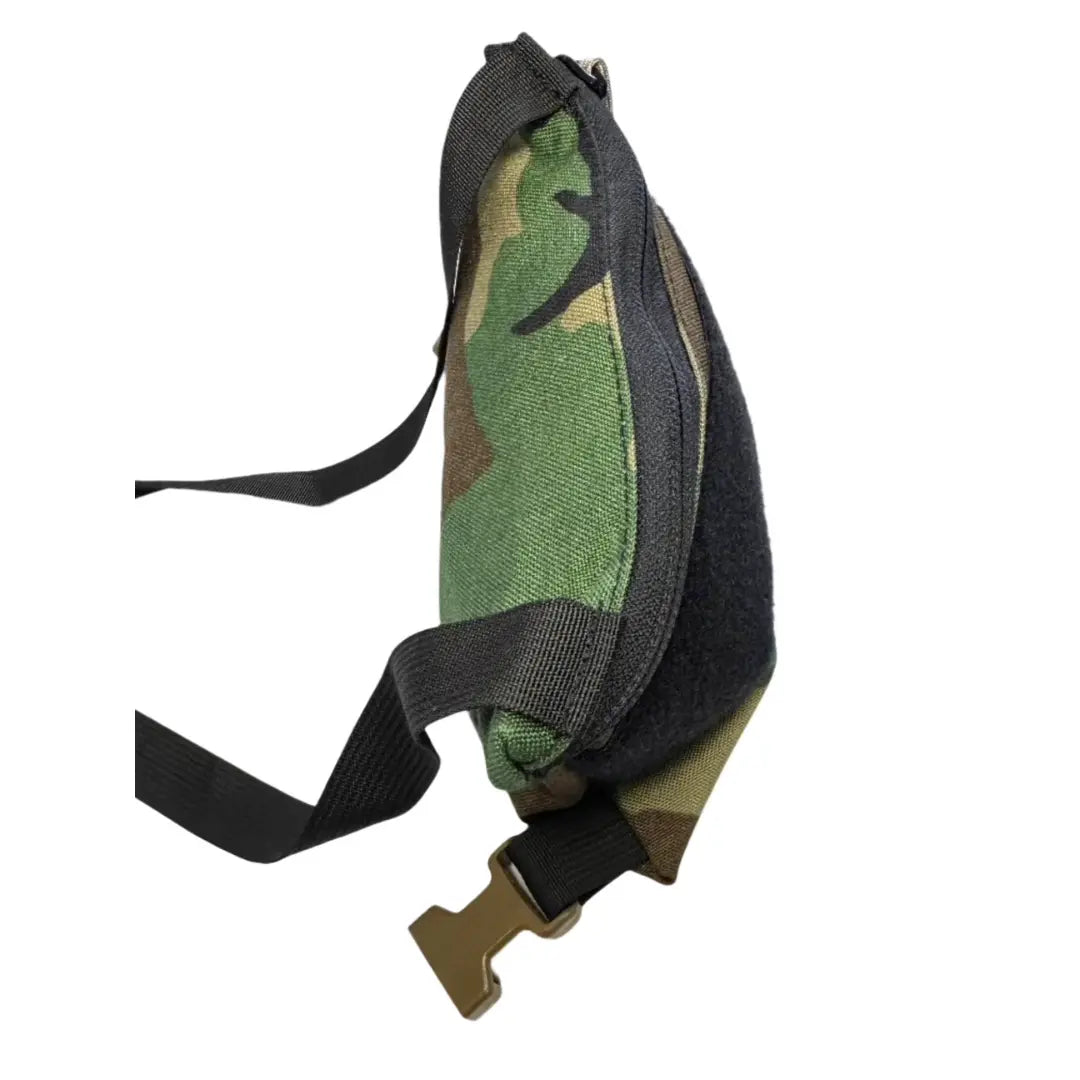 Woodland Minimalist Chest Rig in Woodland Minimalist Chest Rig by Recycled Firefighter. Durable professional gear for tactical applications.