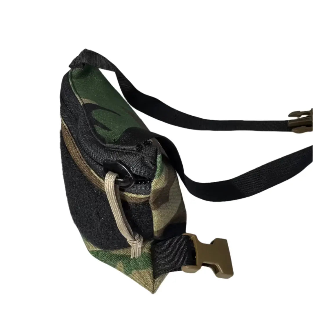 Woodland Minimalist Chest Rig in Woodland Minimalist Chest Rig by Recycled Firefighter. Durable professional gear for tactical applications.