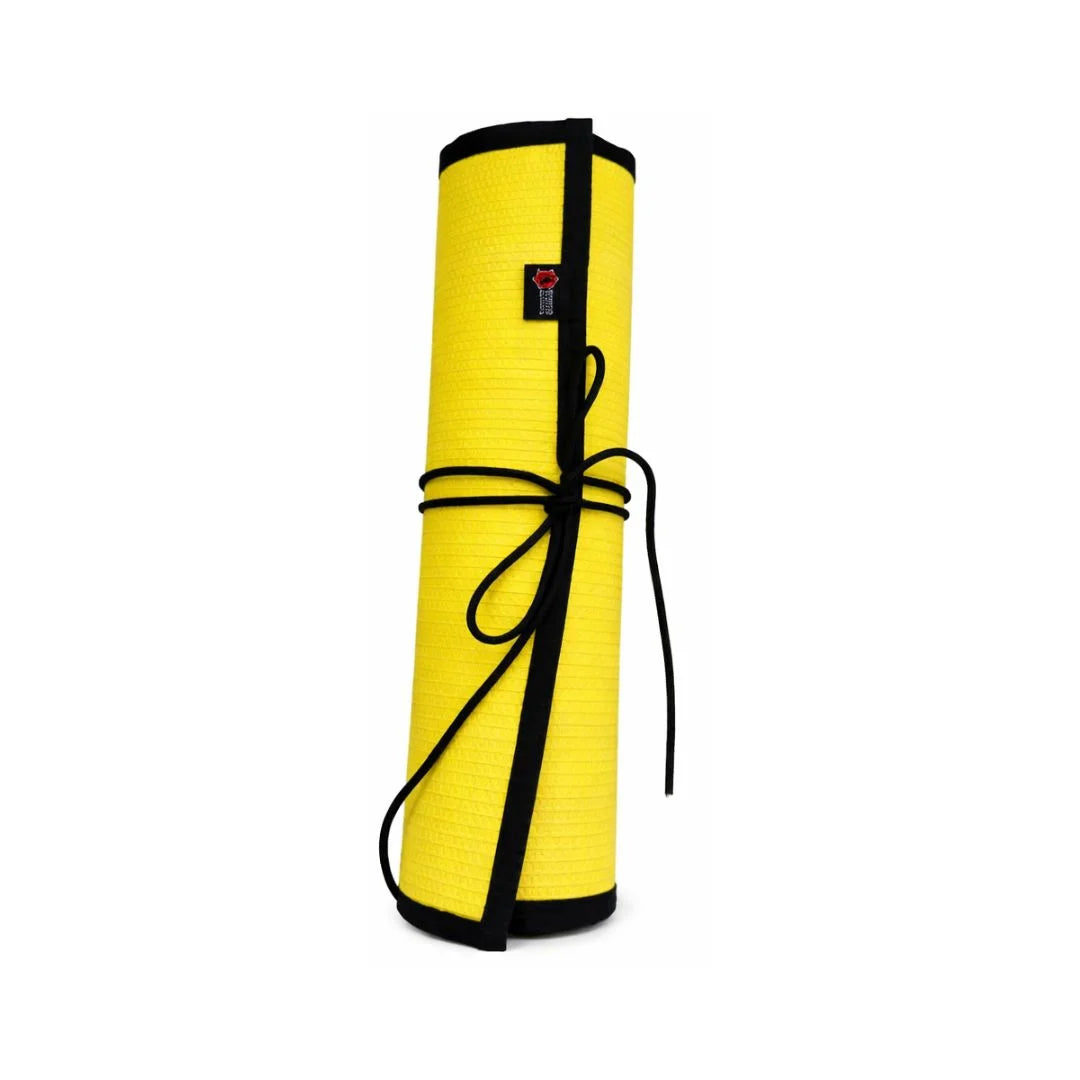 A heavy-duty Drop Zone Mat HD Attack Hose Edition made from repurposed yellow fire hose provides a durable, oil-resistant work surface for firearm maintenance and gear organization.