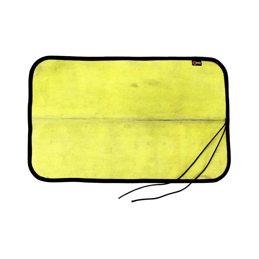 Yellow Black Variant A rugged Yellow Black Drop Zone Mat from Recycled Firefighter featuring a yellow repurposed firehose surface and black 1000D nylon backing. The mat is laid flat to provide a durable workspace for cleaning tools or organizing gear.
