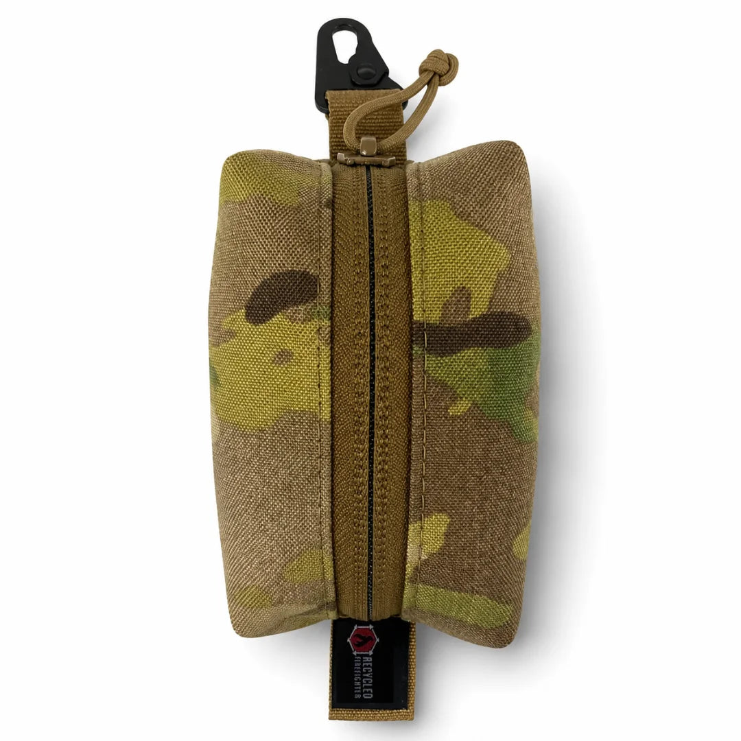 Recycled Firefighter's Hot Shot Commander Keychain Pouch in Multi Cam delivers a mission-ready camouflage exterior built for demanding EDC use. This USA-made clip pouch features a rugged zip closure and integrated metal clip for versatile on-the-go attachment.