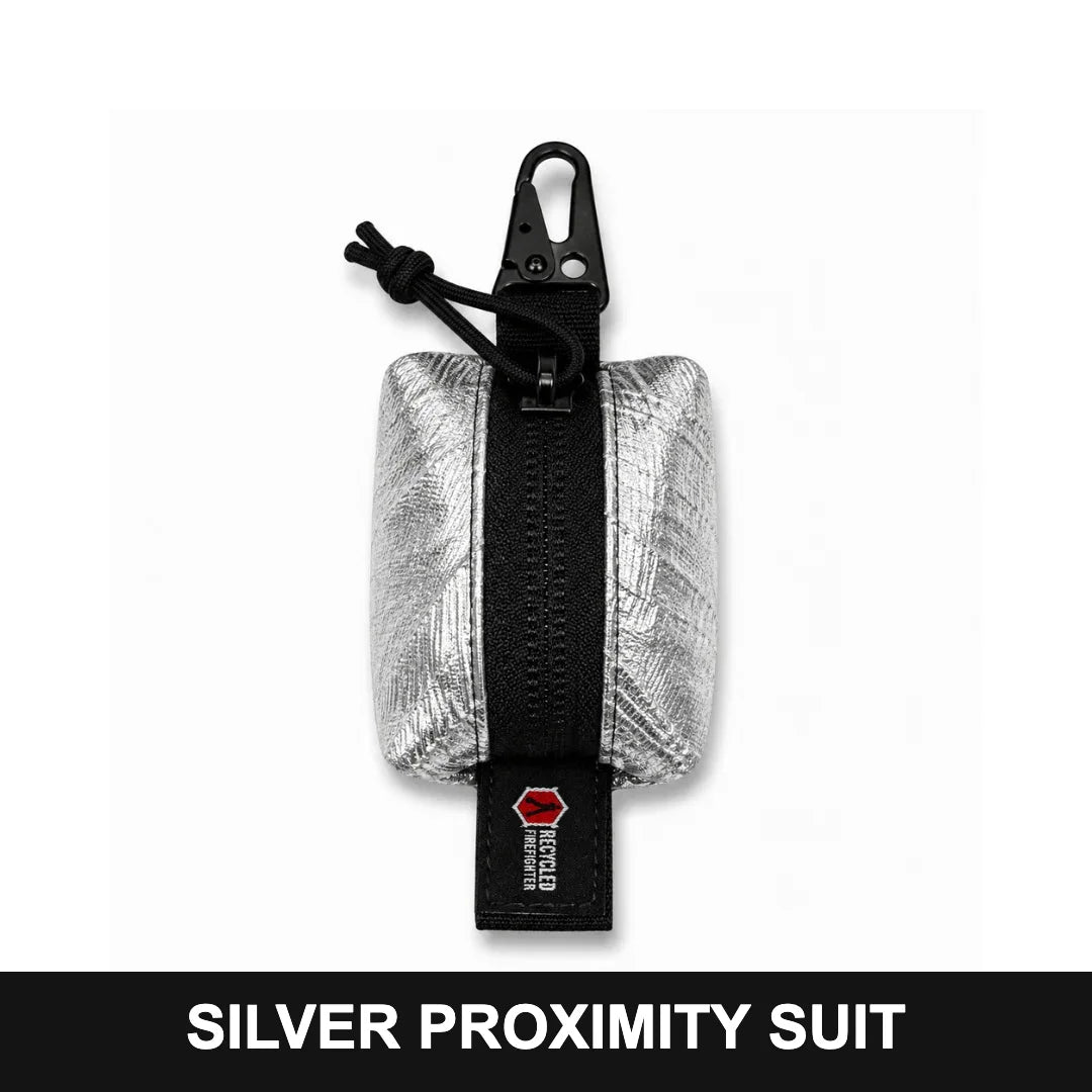 Recycled Firefighter Hot Shot Scout Keychain Pouch in Silver Proximity Suit material, featuring a compact rugged design and secure storage for small essentials.